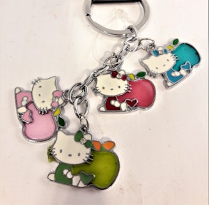 Nyckelring med Hello Kitty-motiv, 4 berlocker