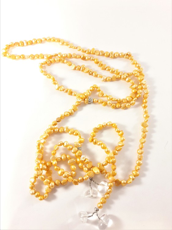 Öppet halsband med små pärlor i orange