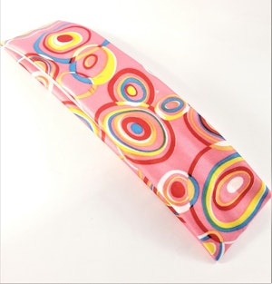 Hårband i glada färger och mönster, elastiskt, rosa bottenfärg