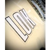Klistermärke | LOK-loggan" (Vit logo + Svart Outline & Transparent Bakgrund)