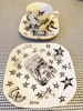 Redesignad keramik /porslin av HELENA ROOS/ Kopp & fat + assiett