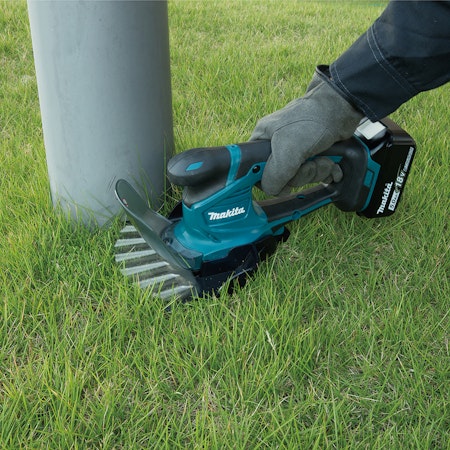 Makita DUM604ZX kant- / häcksax (utan batteri)