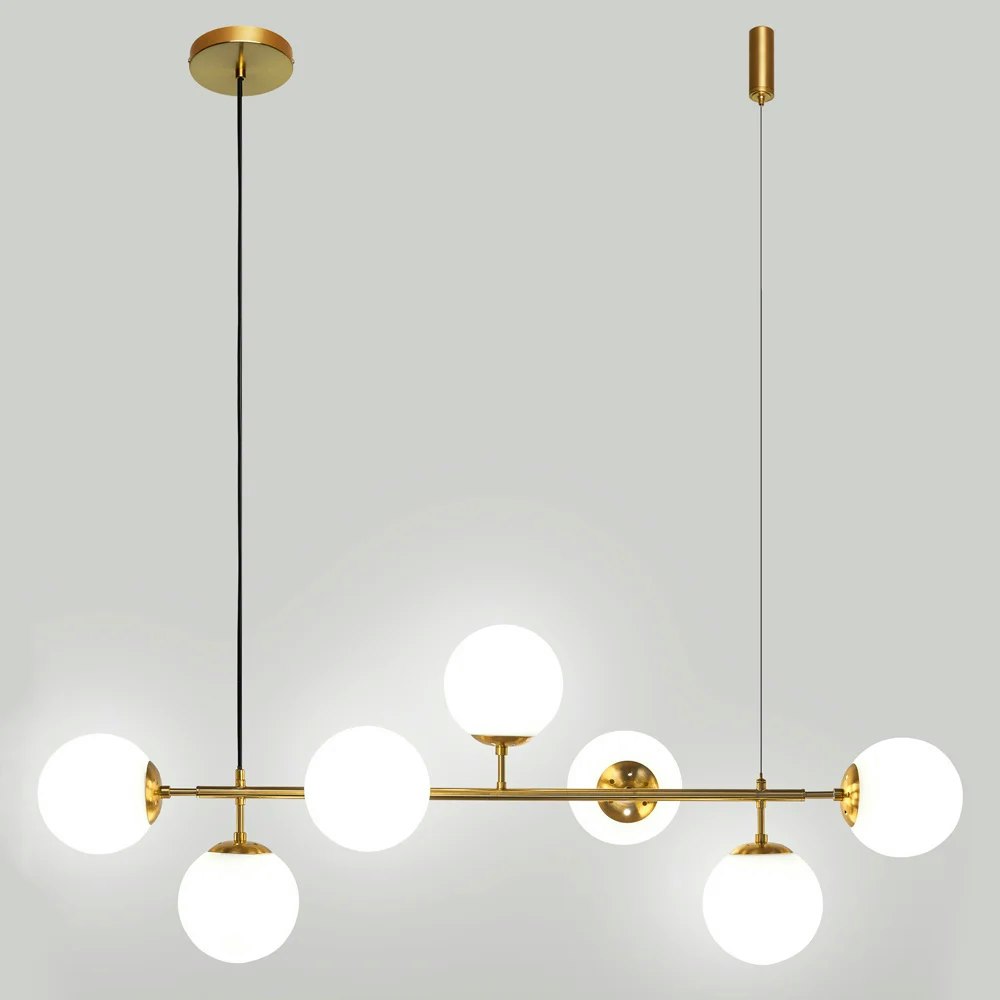 Design taklampa Hepta med guld och mjölkglas