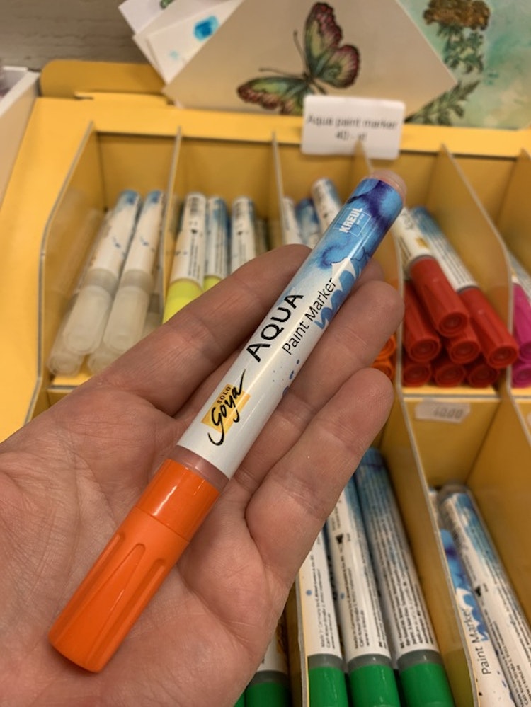 Orange penna med penselspets