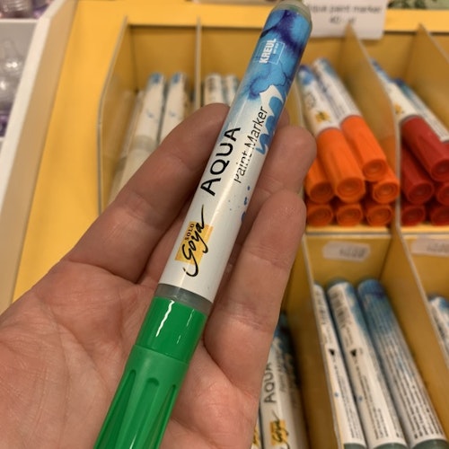 Grön gul penna med penselspets