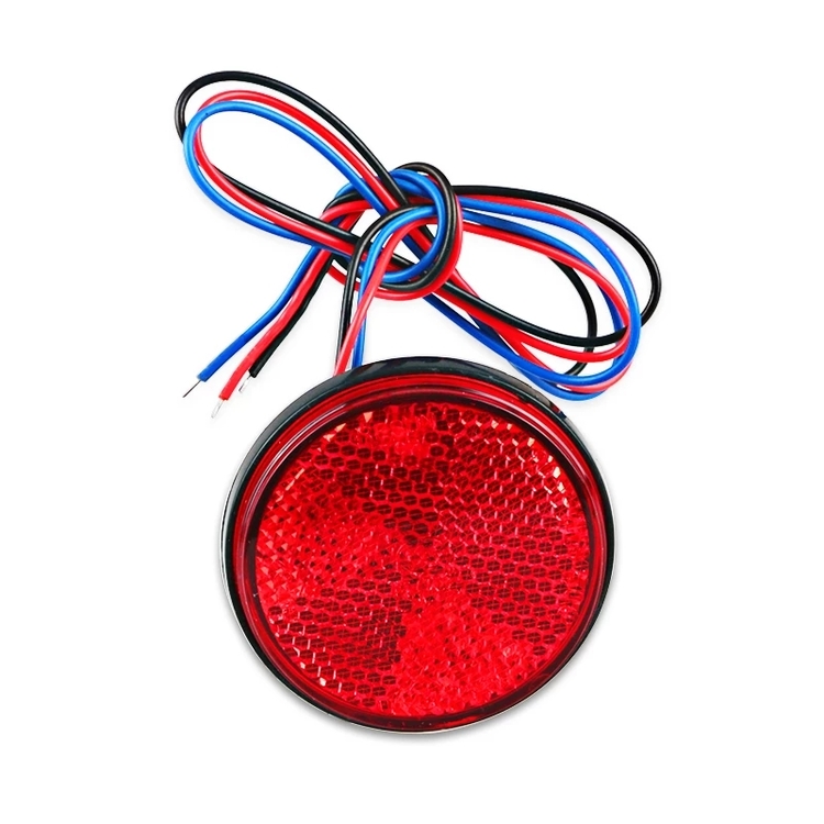 Baklykta rund LED i röd färg