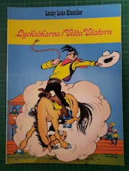 Lucky Luke 51 Lycksökarna i Vilda Västern (Svensk utgave)