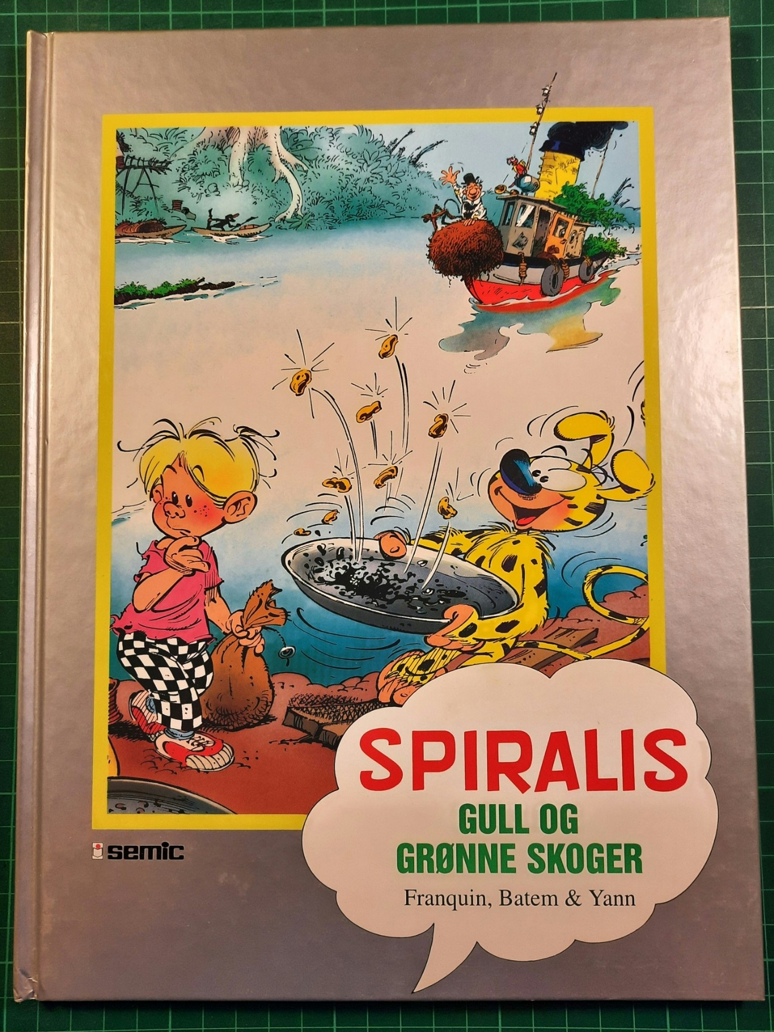 Spiralis gull og grønne skoger