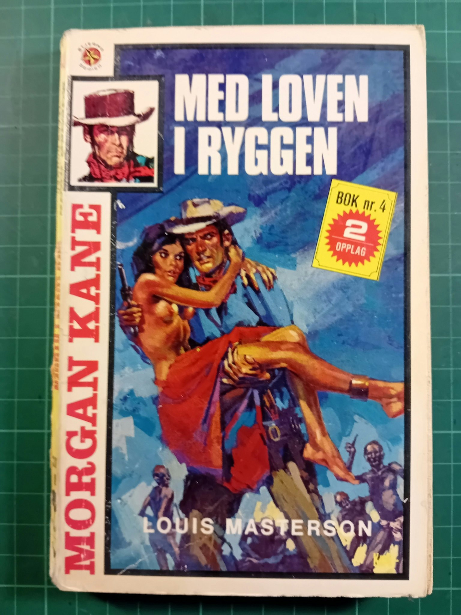 Morgan Kane pocket 04 Med loven i ryggen