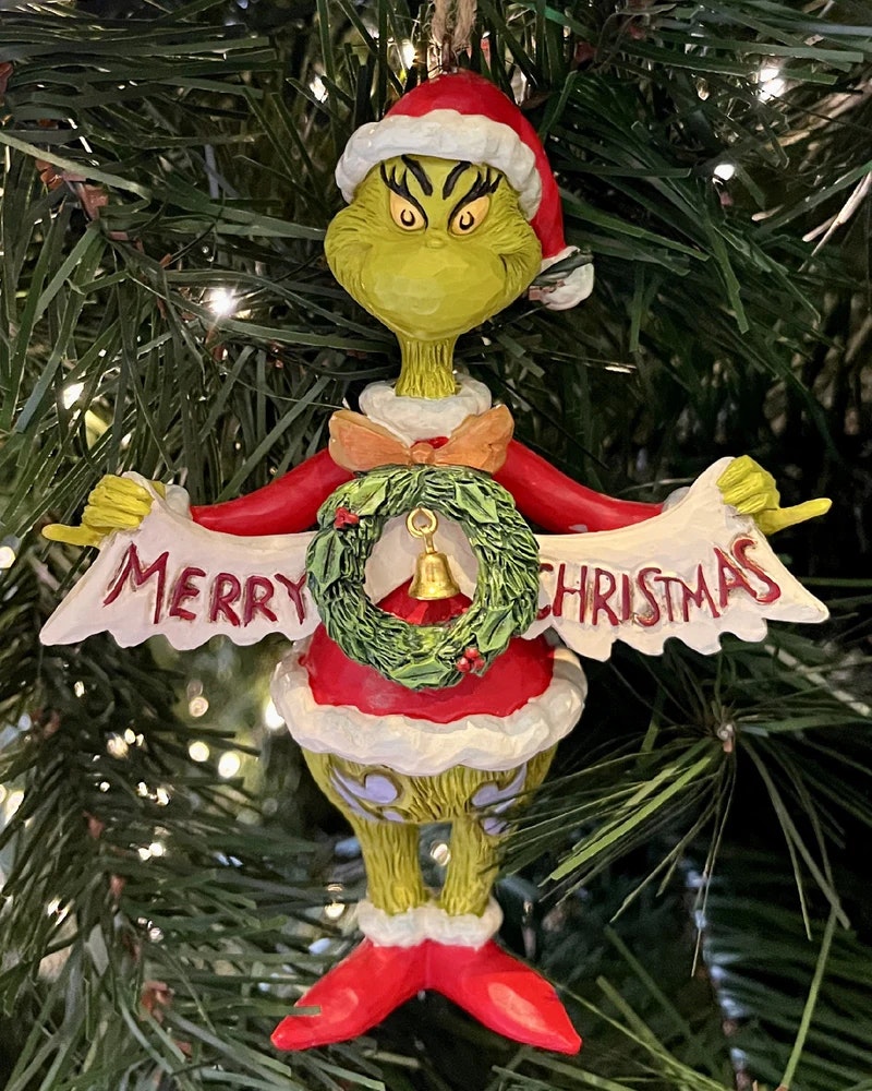 Grinch Holding Merry Christmas Banner (Hanging Ornament)