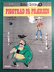 Lucky Luke 28 Piggtråd på prærien