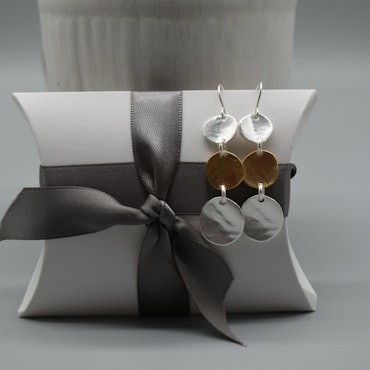 Handmade earrings in gold and silver from Karine Sultan
