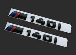 BMW Modellbeteckning M140i Svart
