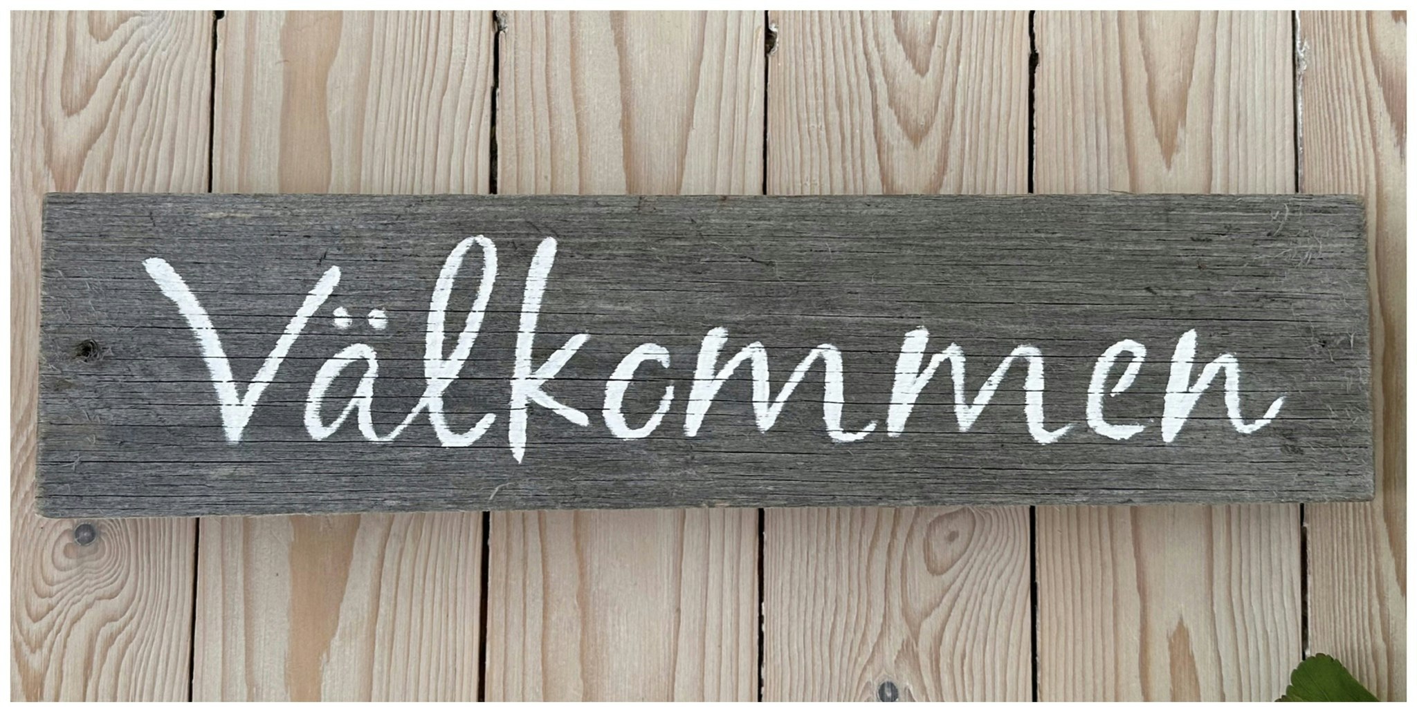 Välkommenskylt