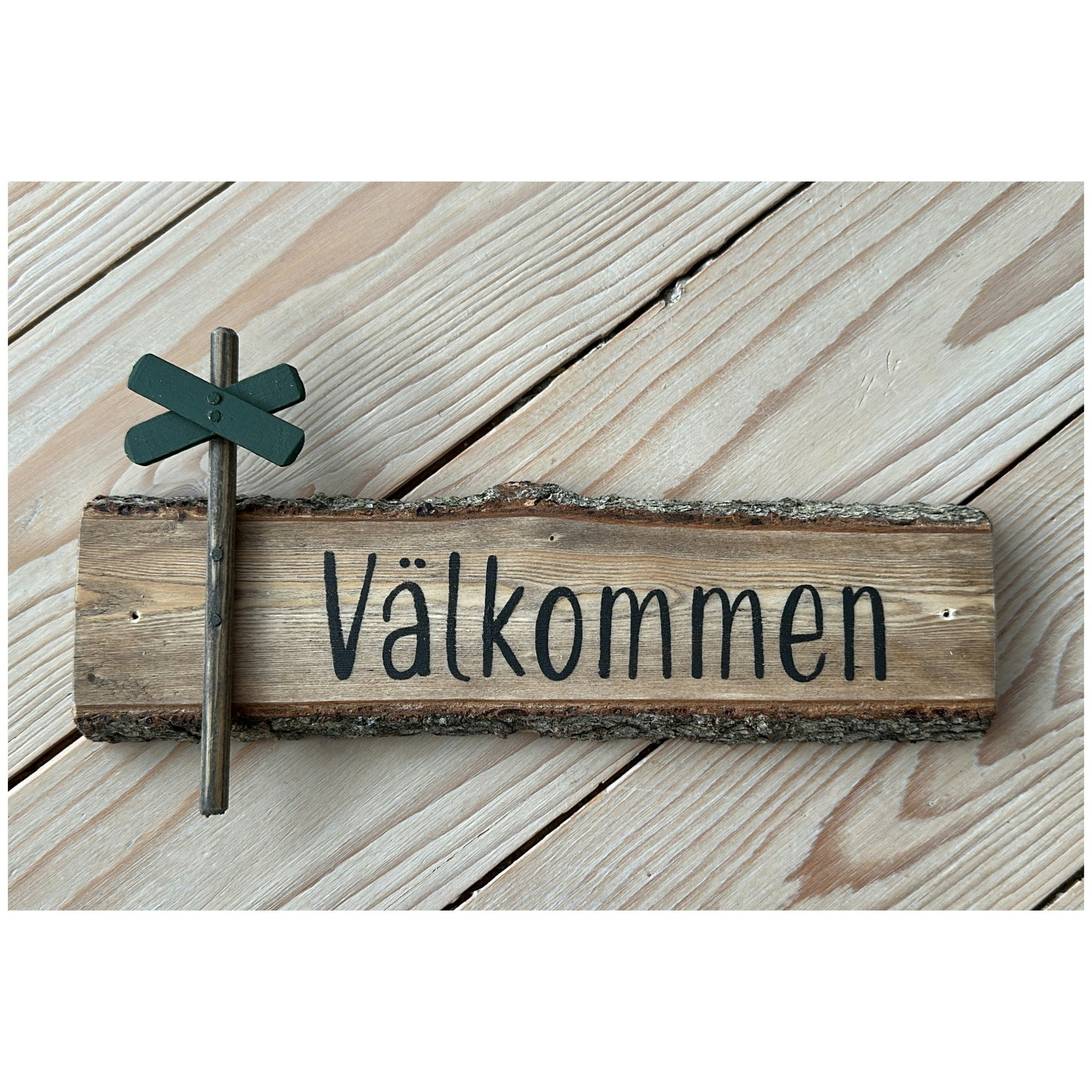 Välkommenskylt av gran, Ledkryss