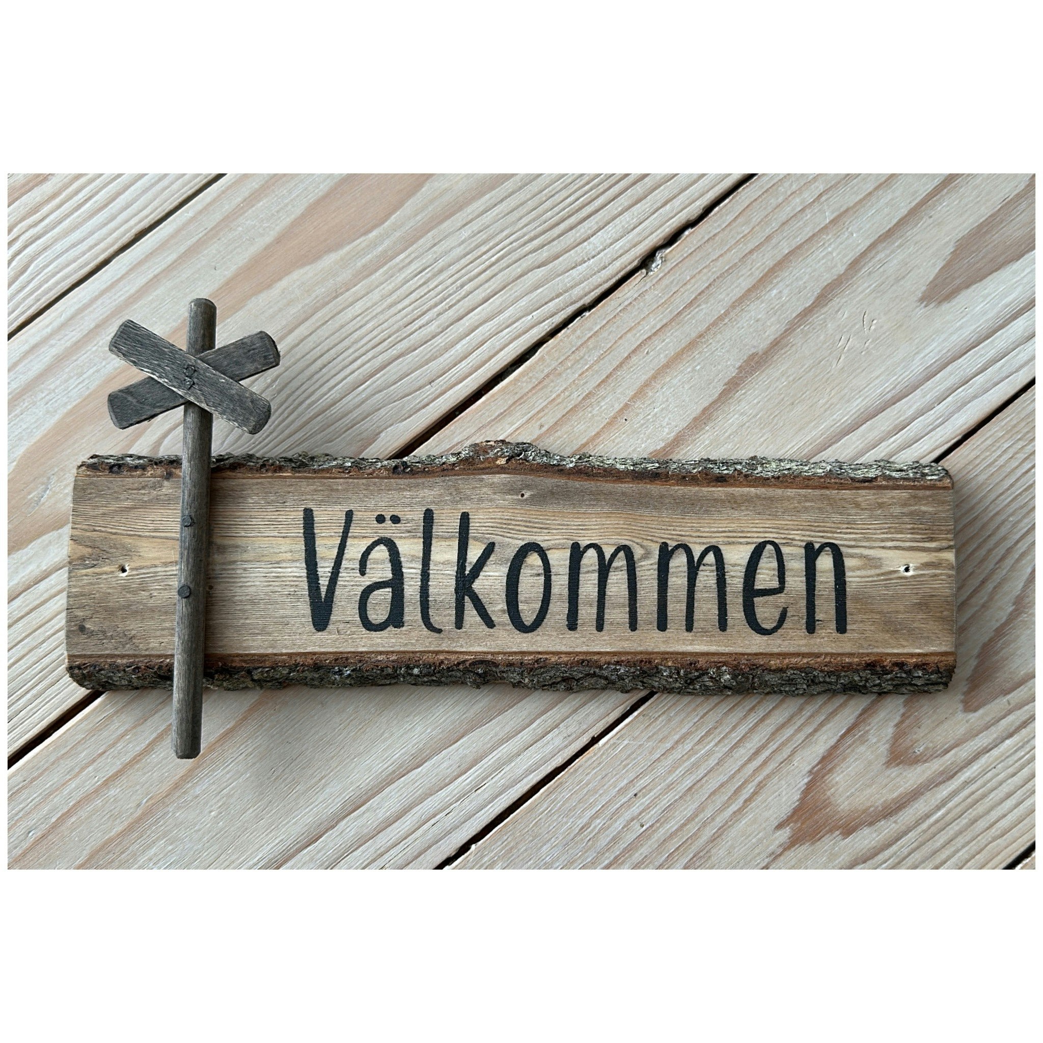 Välkommenskylt av gran, Ledkryss
