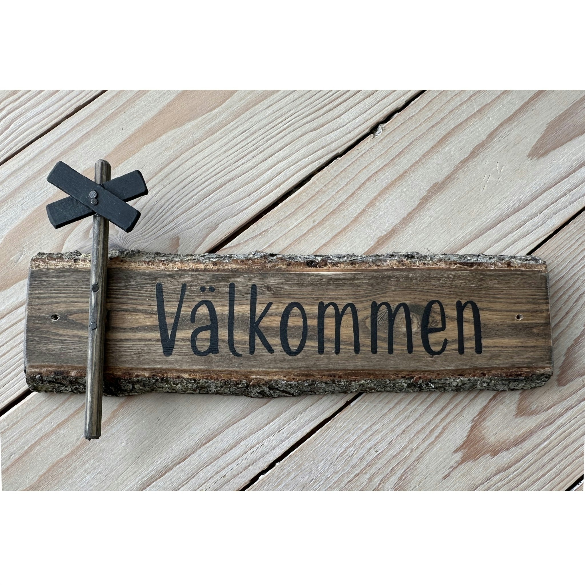 Välkommenskylt av gran, Ledkryss