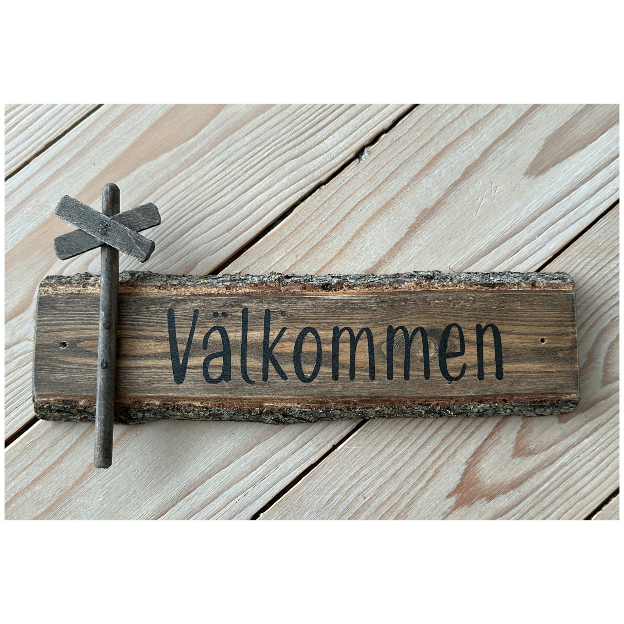 Välkommenskylt av gran, Ledkryss