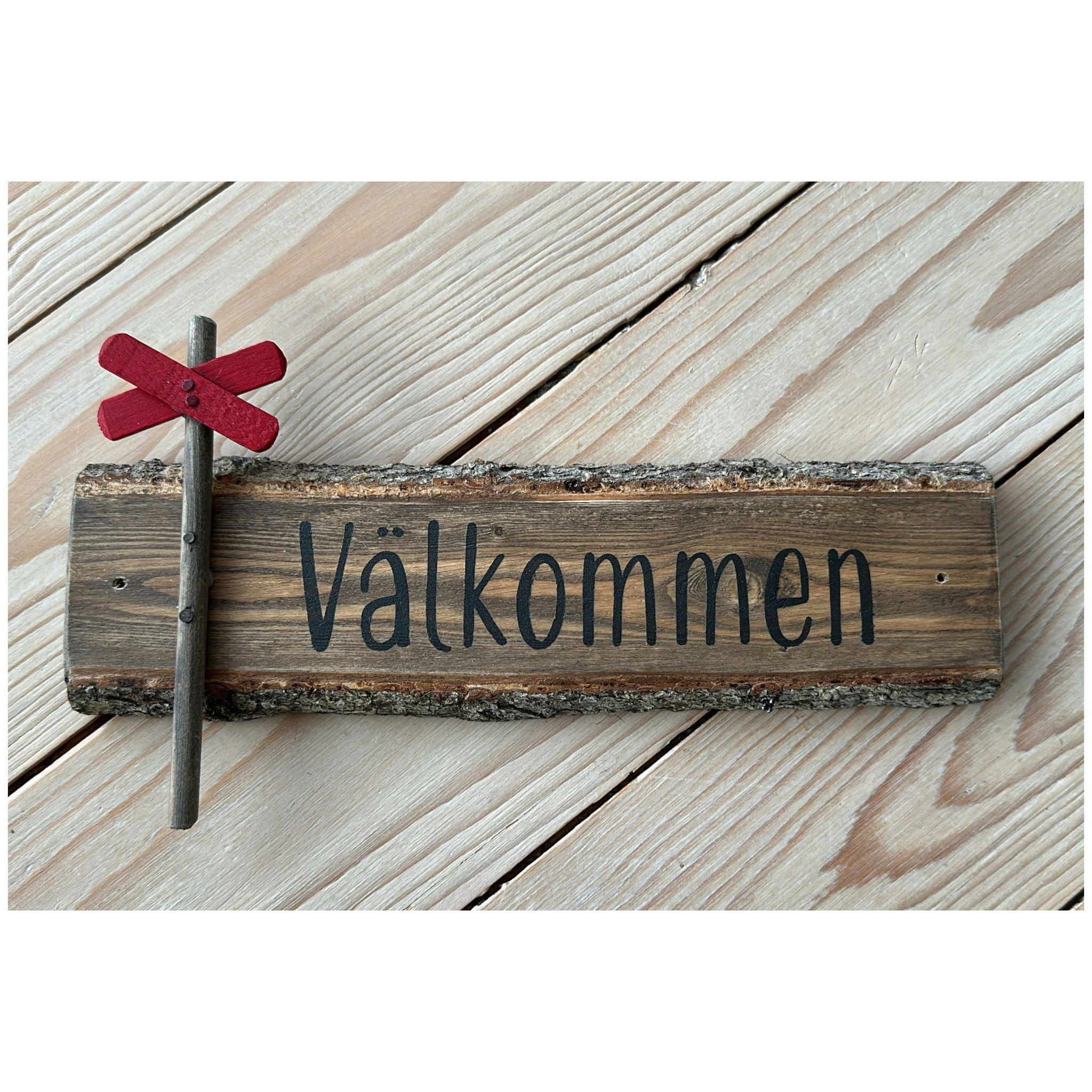 Välkommenskylt av gran, Ledkryss