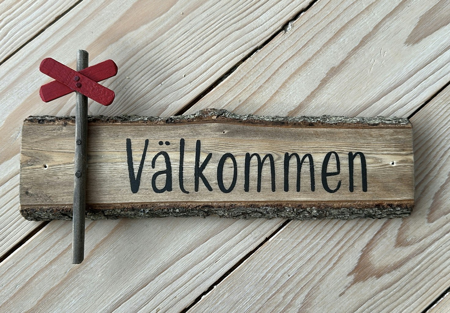 Välkommenskylt av gran, Ledkryss