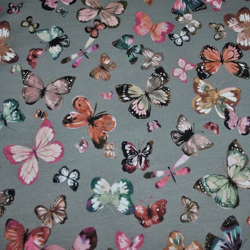 Joggingtyg med färgglada fjärilar