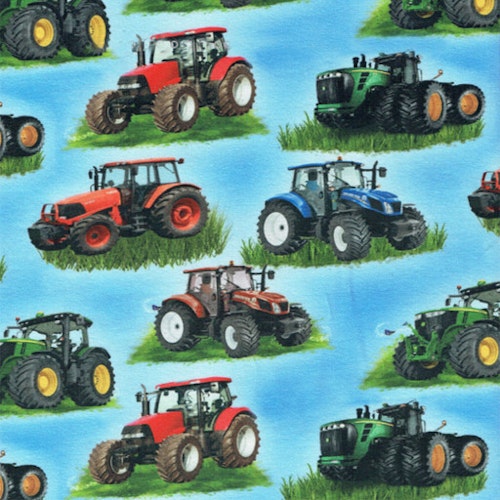 Trikåtyg Traktorer på himmelsblå botten