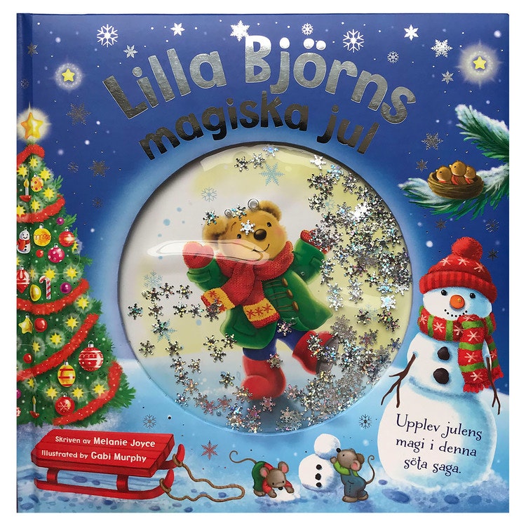 Bilderbok för de minsta barnen. Följ med på Lilla björns magiska jul. Framsida med glitter som rör sig över Lilla björn.