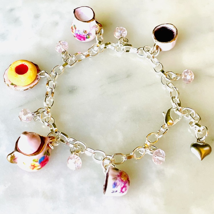 Armband ”kafferep” rosa pärlor och berlocker