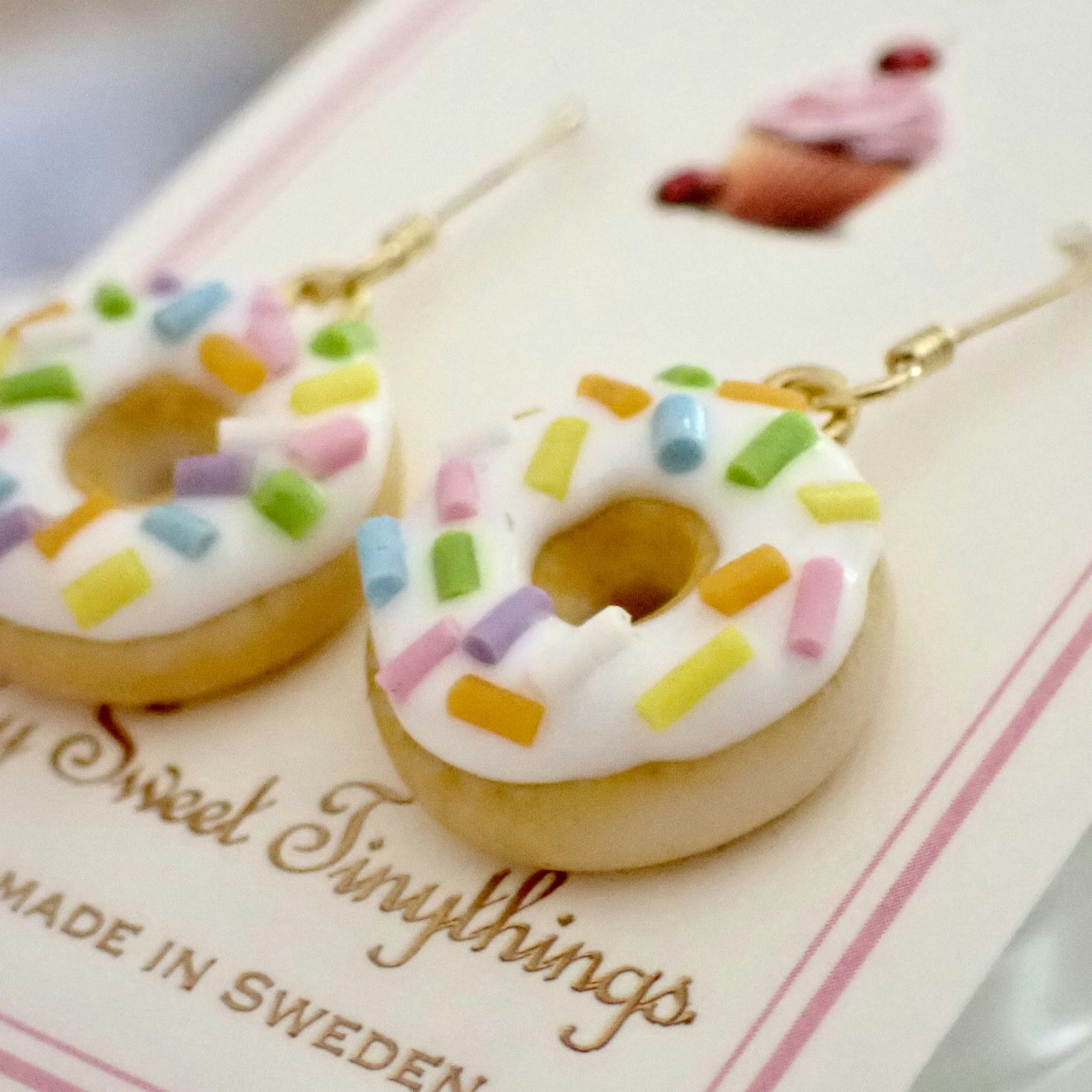 Donuts / munkar vit glasyr och strössel silver / guld