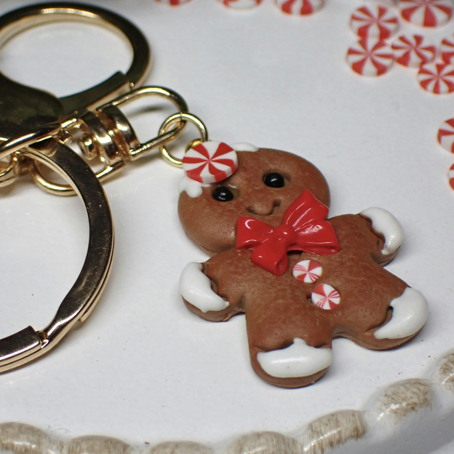 Pepparkaksgubbe nyckelring silver/guld