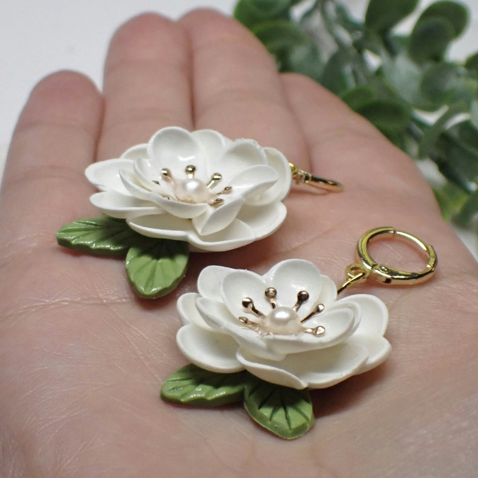 Magnolia vita guld/silver