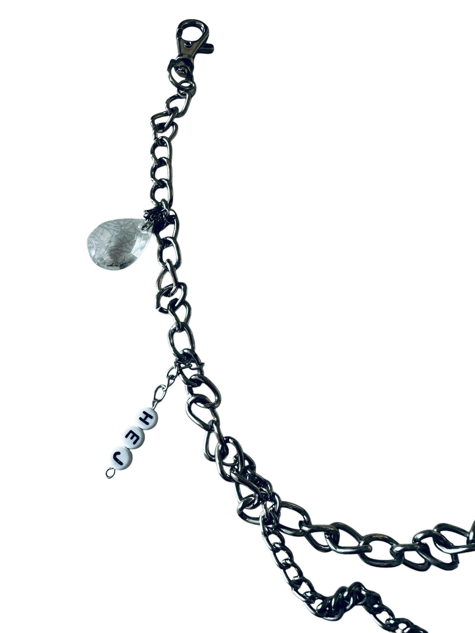 Handgjord silverfärgad bagcharm