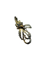 Brosch med strass och rosett