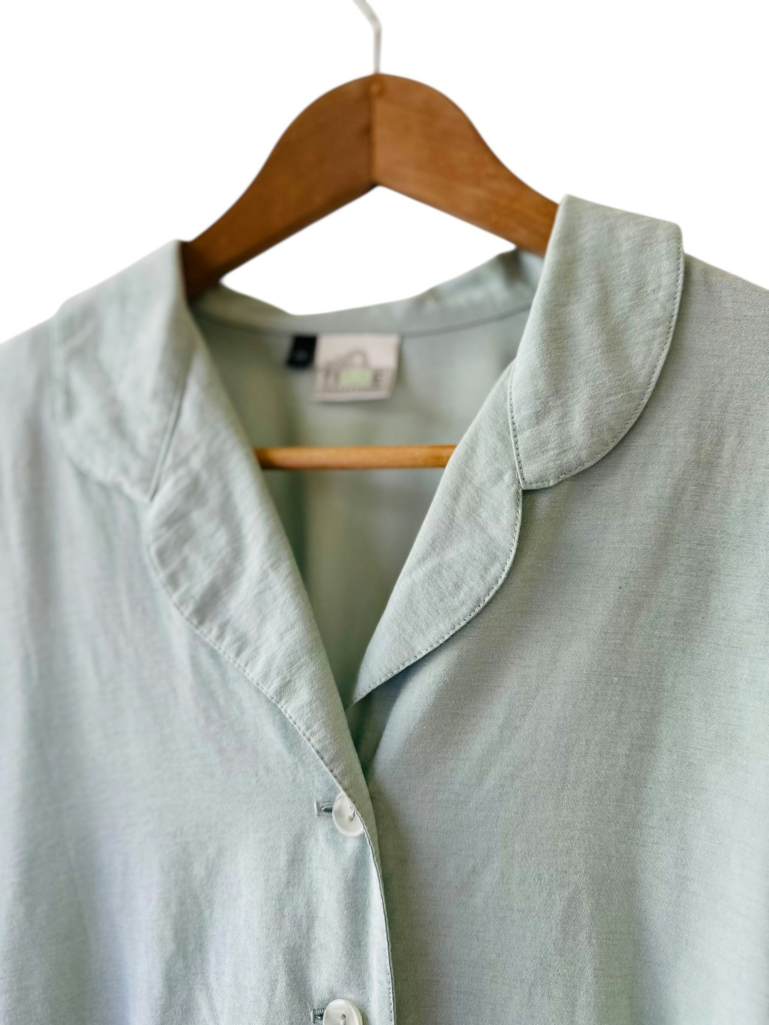 Ljust grön vintage 90-talsblus