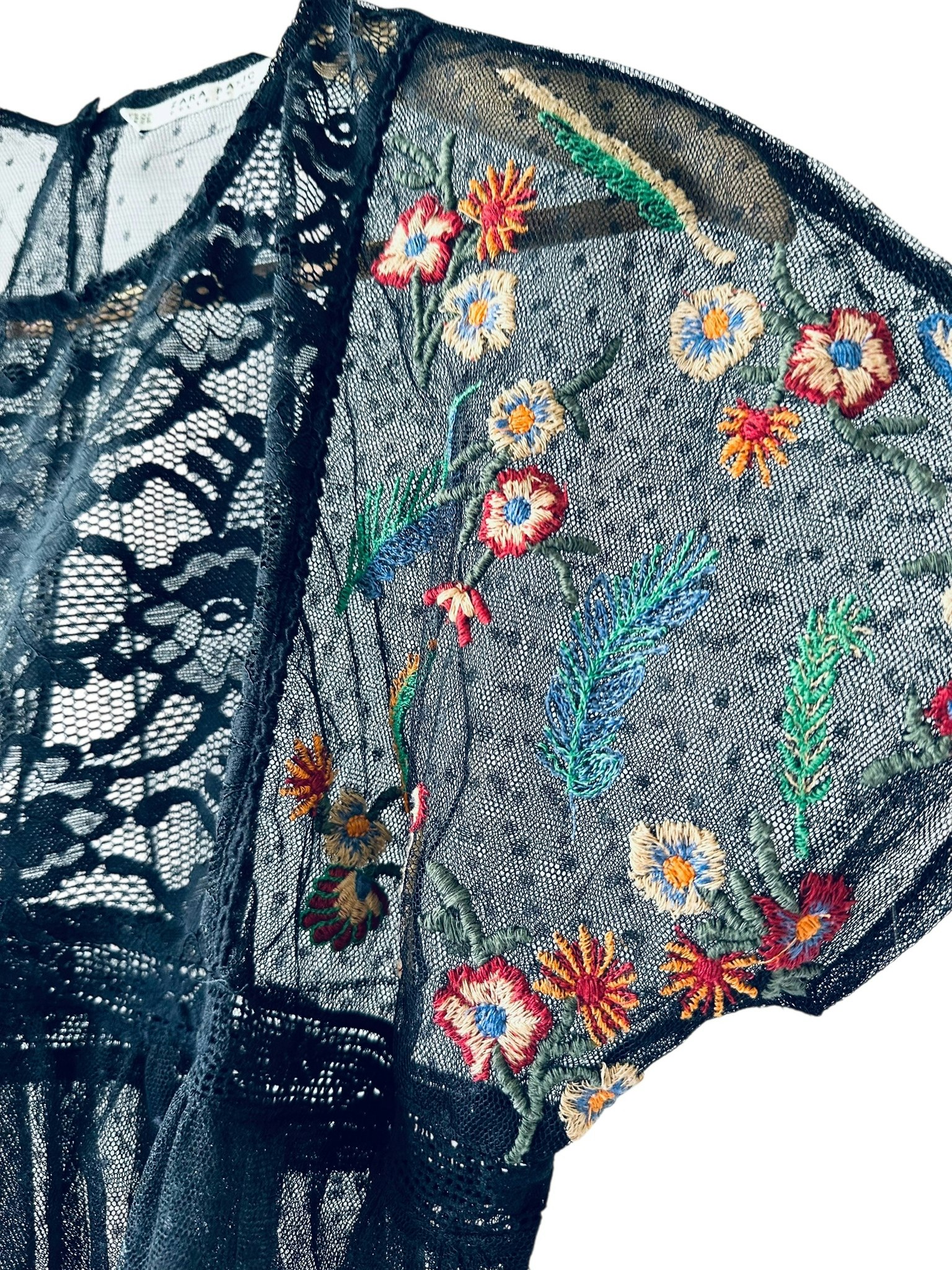 Transparent topp med broderier
