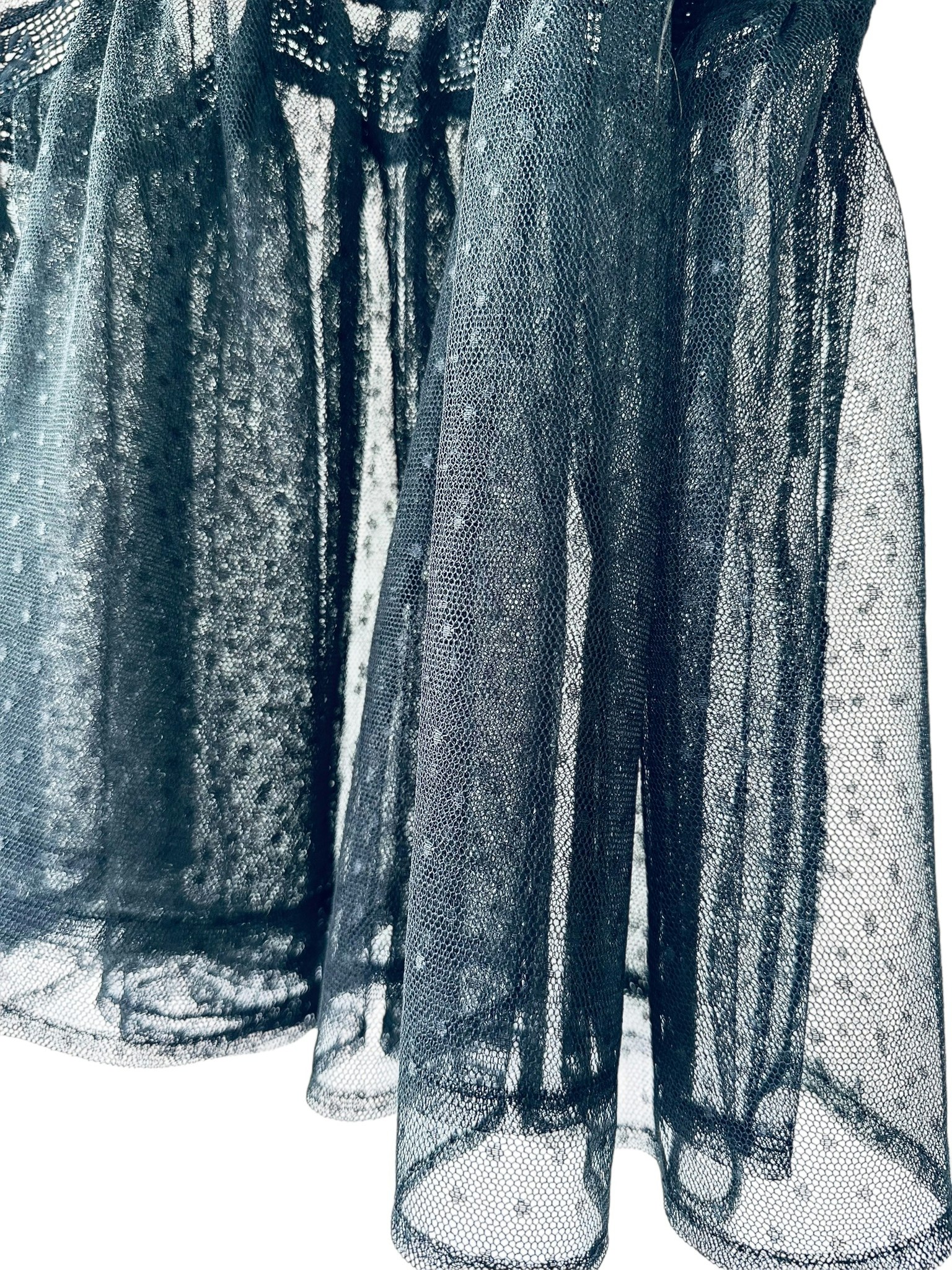 Transparent topp med broderier
