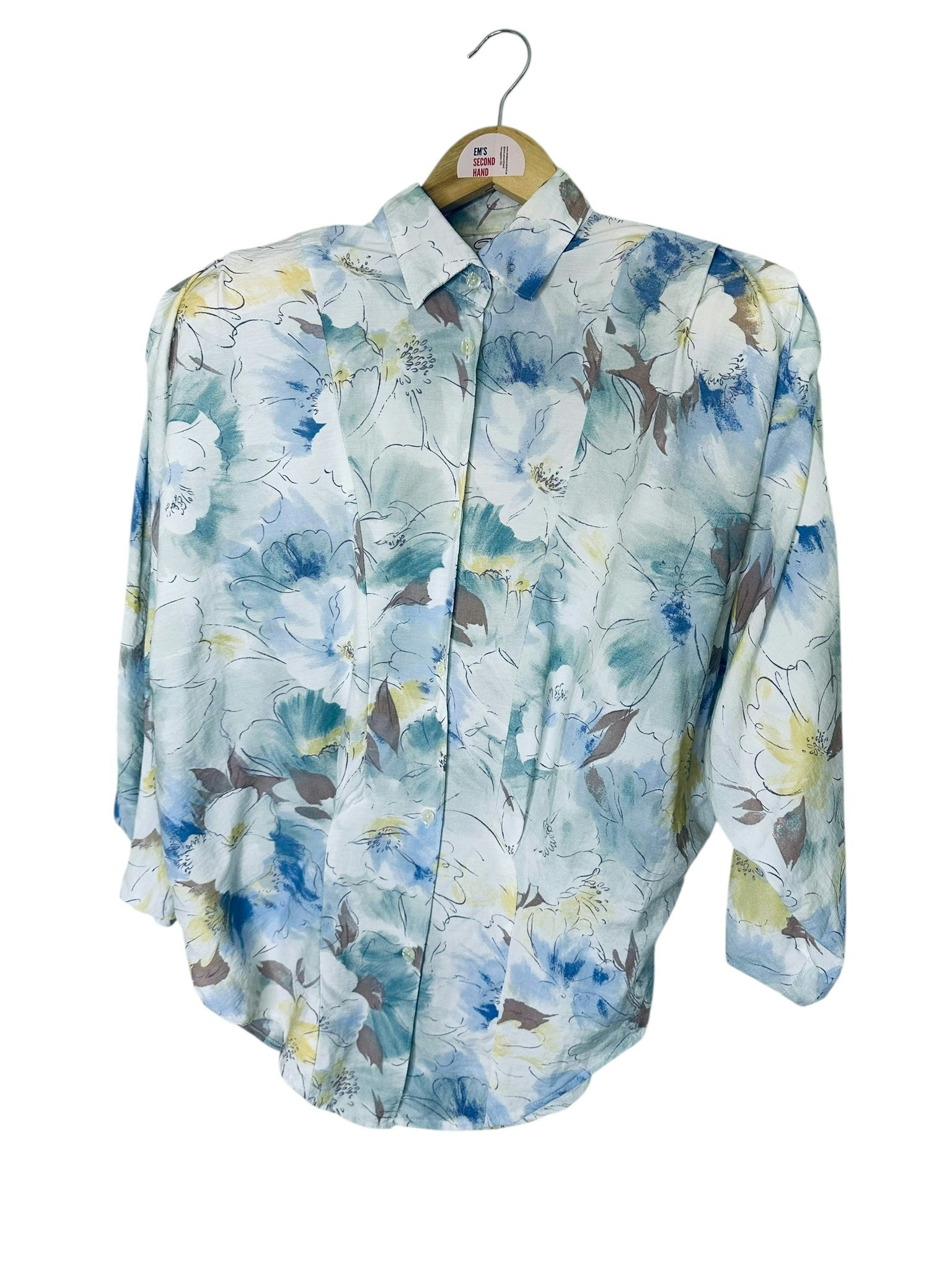 Vintage blus med markerade axlar