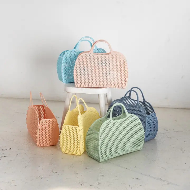 Citrongul retro strand väska i plast mesh med handtag