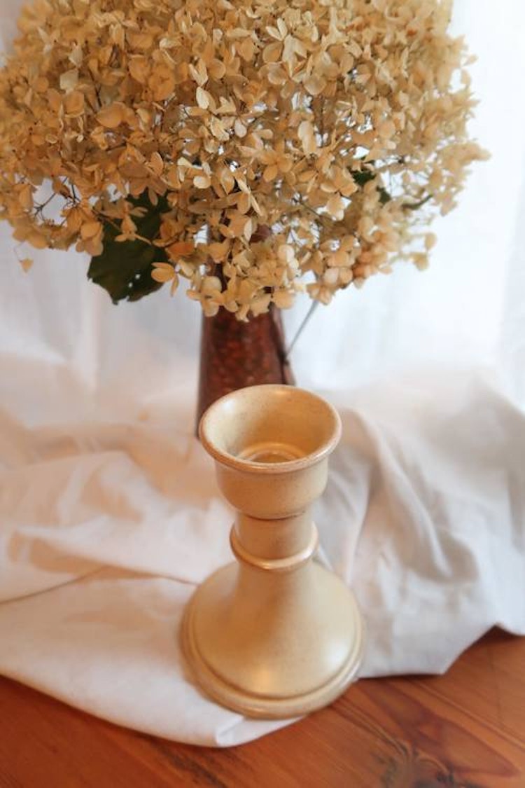 Beige ljusstake