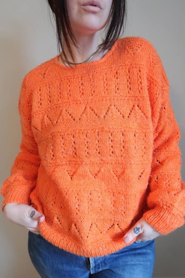 Orange hemmastickad tröja