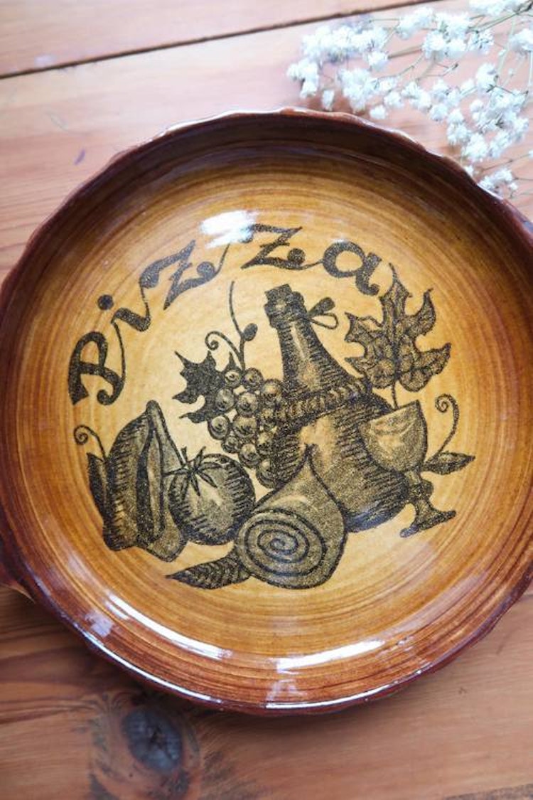 Pizzatallrik med handtag