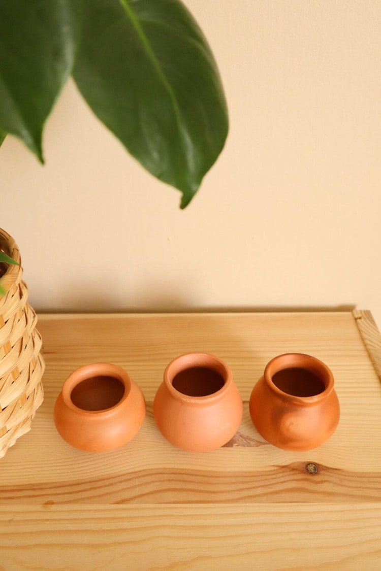 Tre mini terracotta vaser