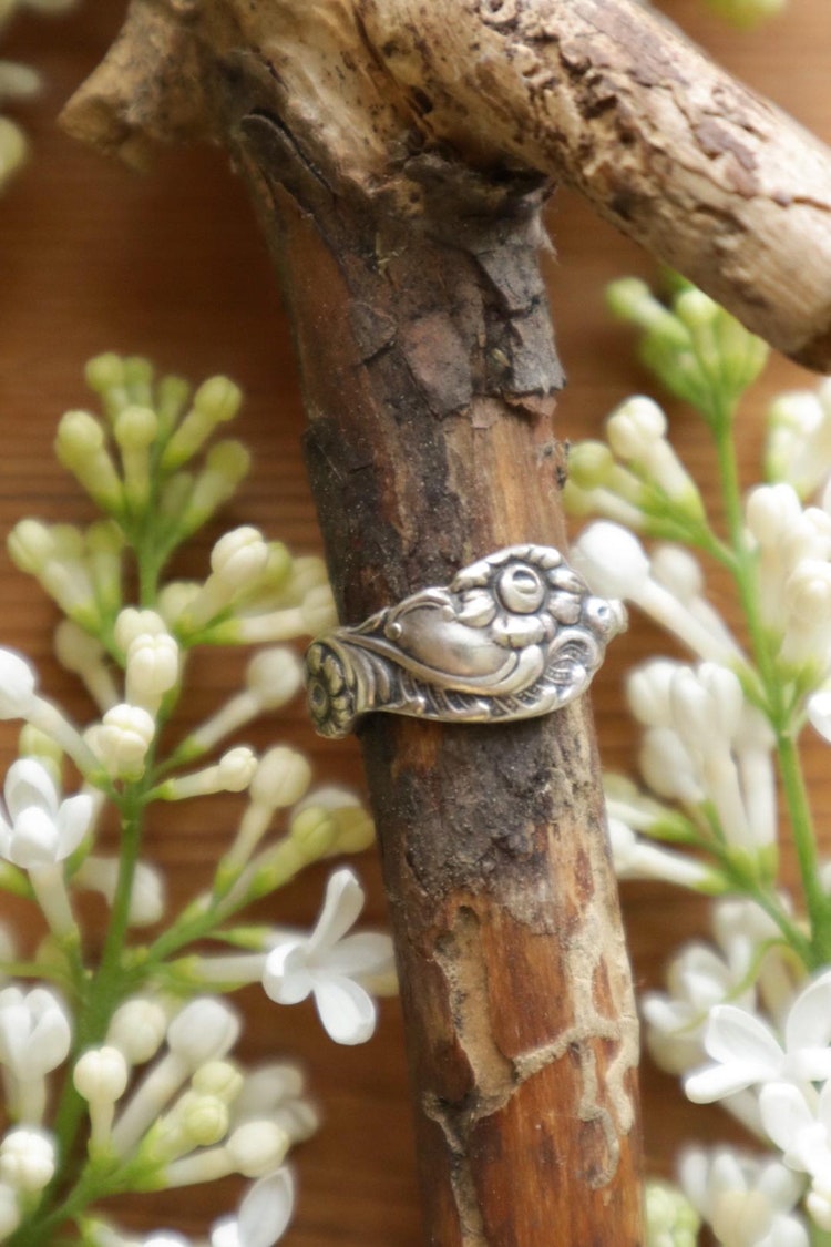 13. Storlek 21, 61 mm. Nysilver.