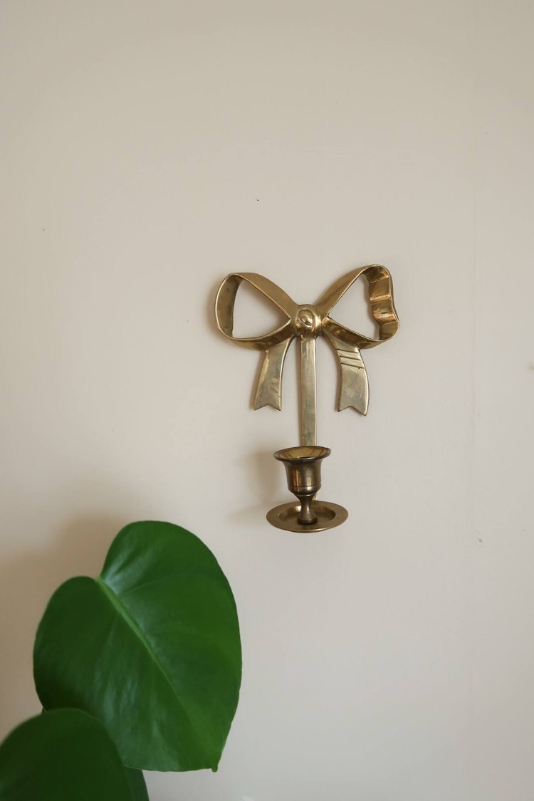 Väggljusstake rosett mässing