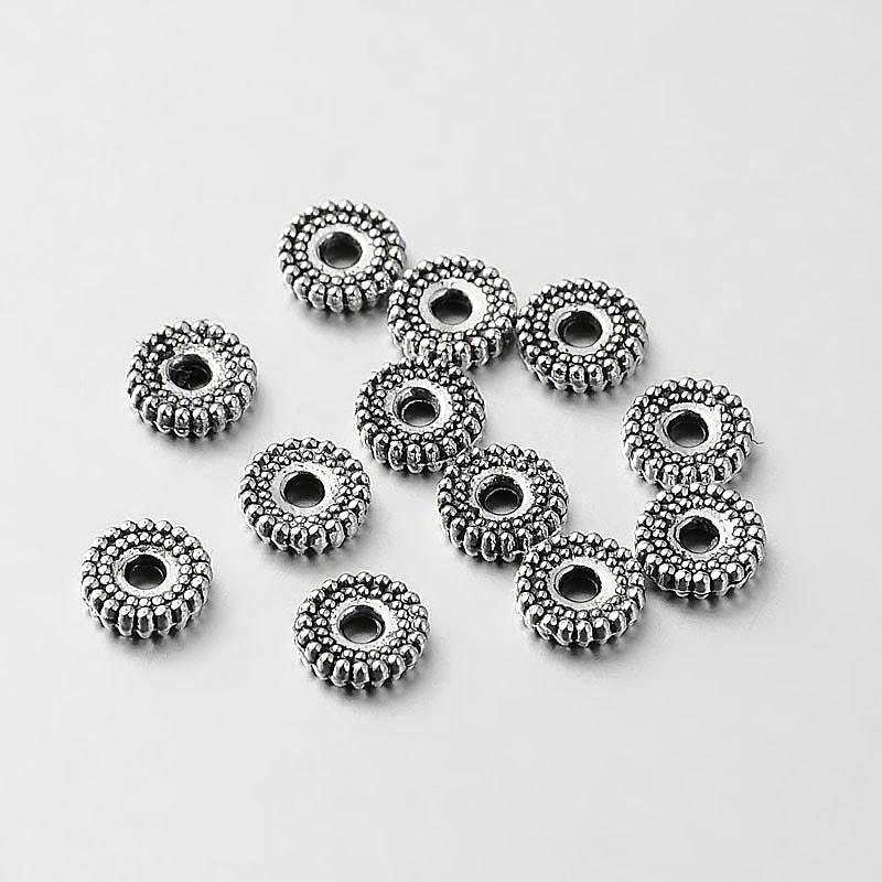 Mellandel, Rondeller, 7x2mm, 25st