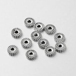 Mellandel, Rondeller, 7x2mm, 25st