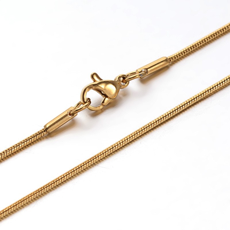 Guldfärgat rostfritt stål snakechain 60 cm med PVD plätering, 1 st