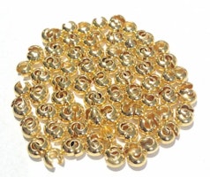 Guldfärgade knutgömmor 6 mm, ca 50 st