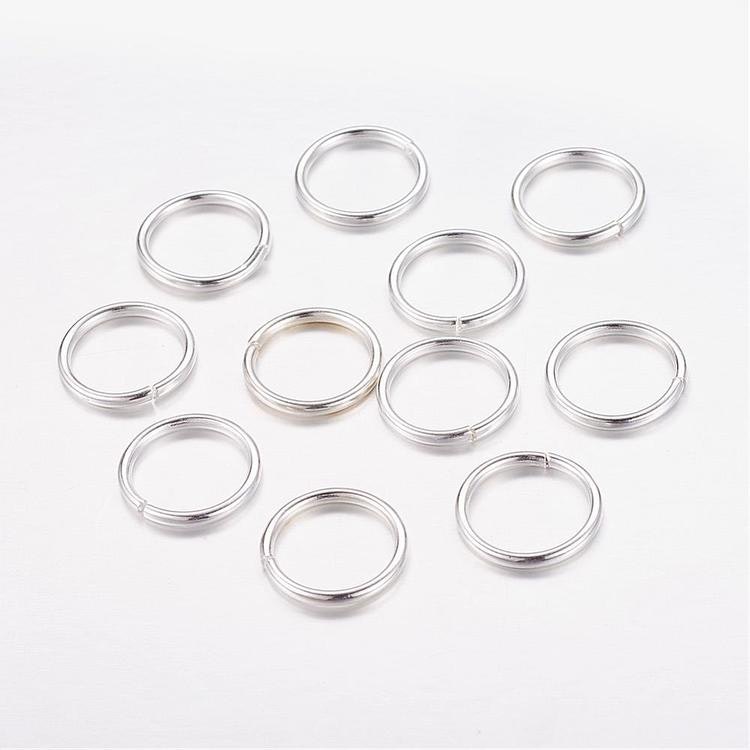 Silverfärgat rostfritt stål bindringar 5 mm, ca 200 st