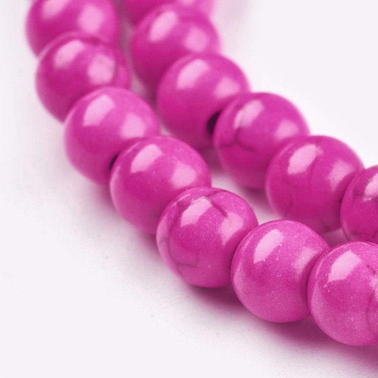 Howlite cerise 4 mm, 1 sträng